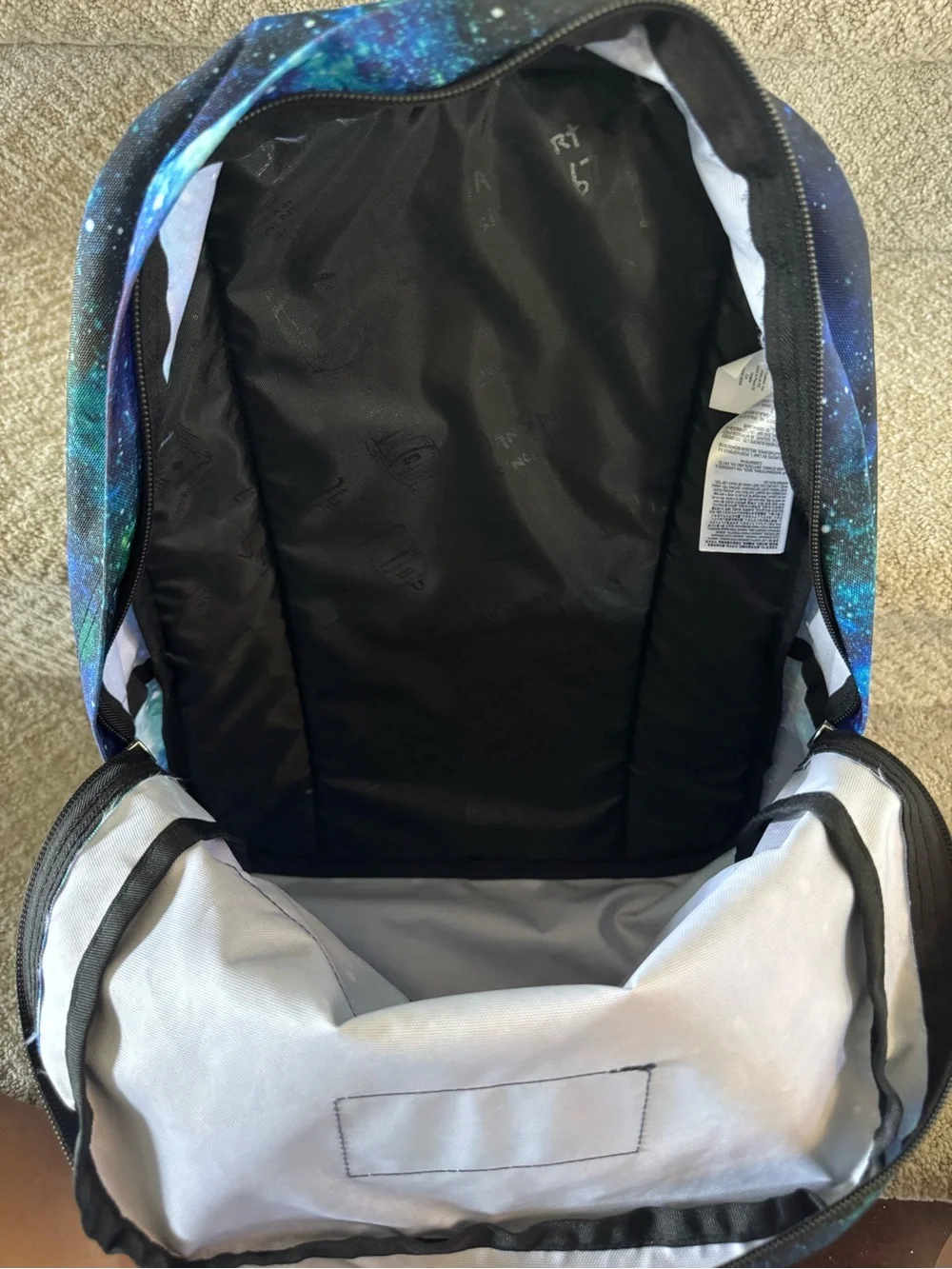 Jansport Cross Town—Cyberspace Galaxy Backpack in Blue & Green Nebula Print